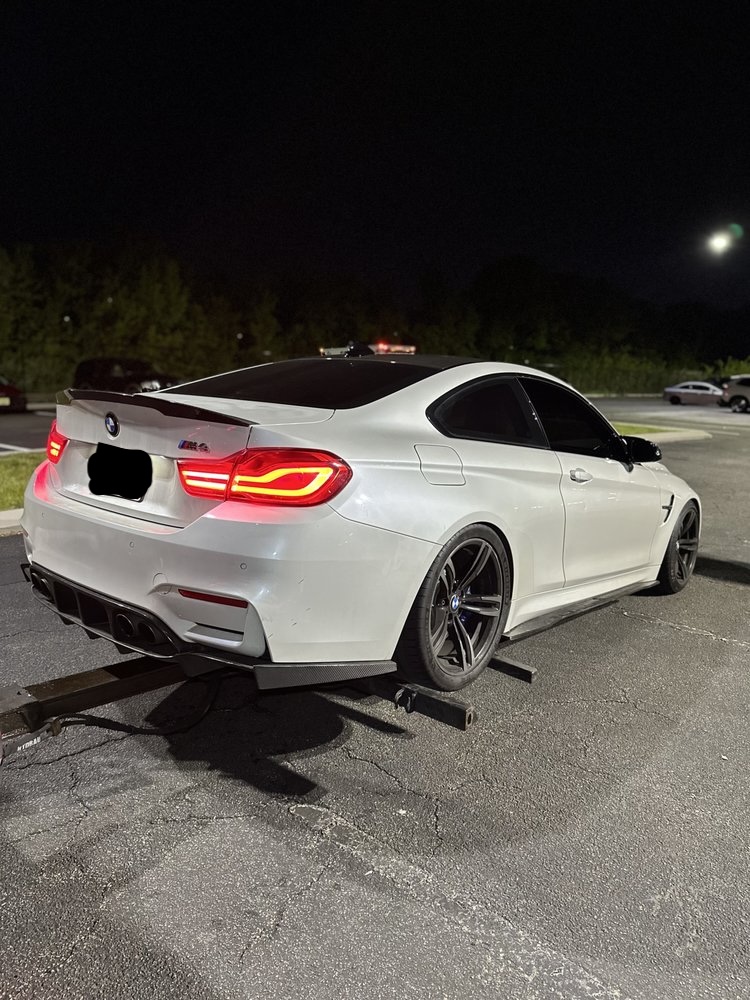 Performance coupe collected at night